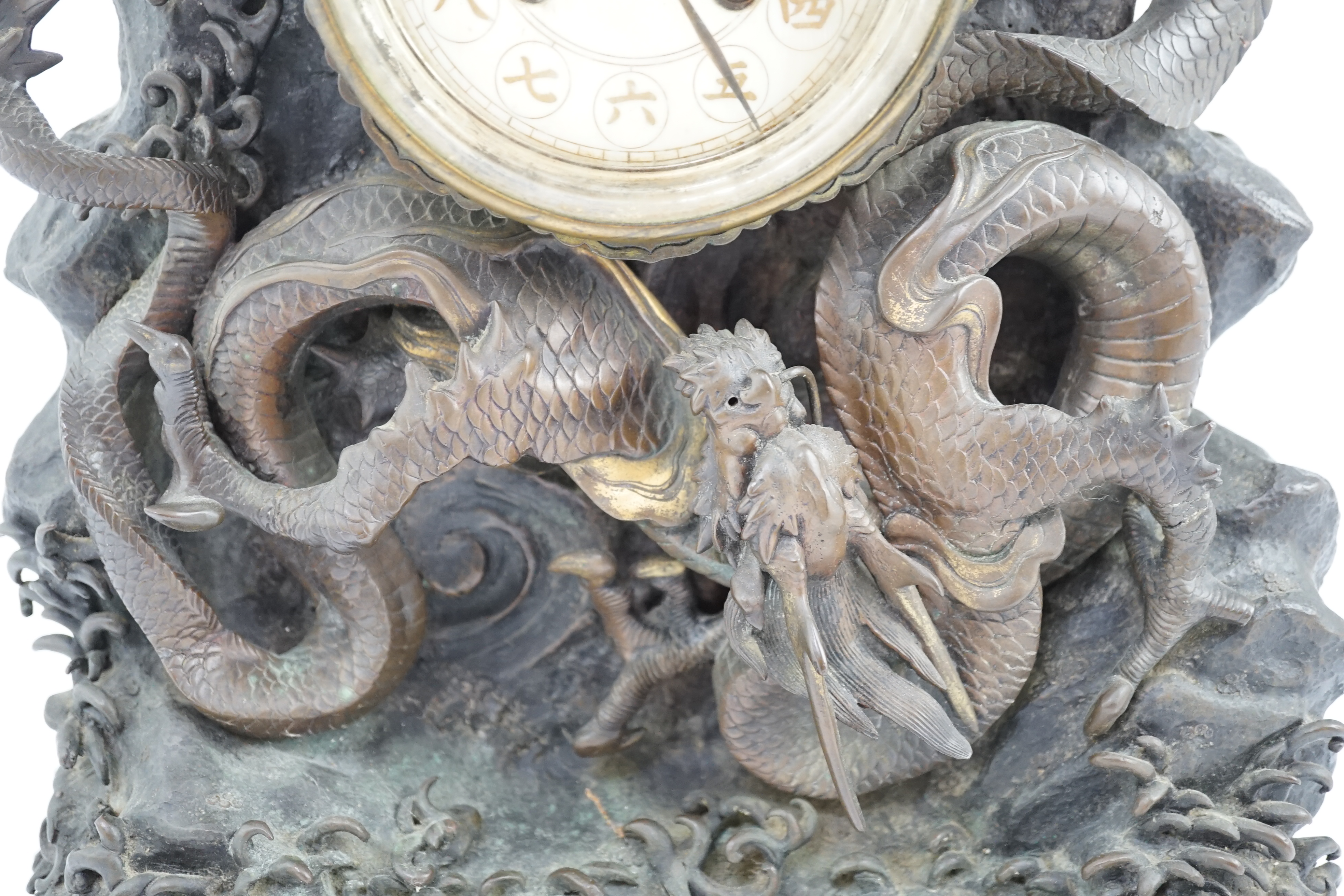 A Japanese parcel gilt bronze ‘dragon’ mantel clock, Meiji period, CITES submission reference:WX9VSMU6